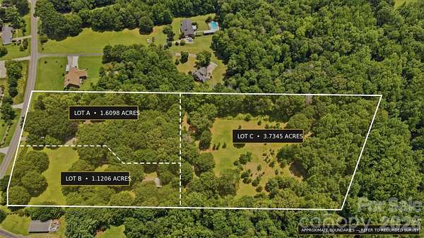 6.45 Acres of Land with Home for Sale in Mount Holly, North Carolina