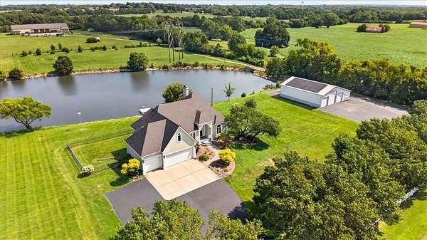 5 Acres of Land with Home for Sale in Raymore, Missouri