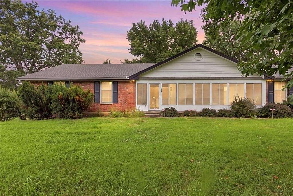 5 Acres of Land with Home for Sale in Peculiar, Missouri