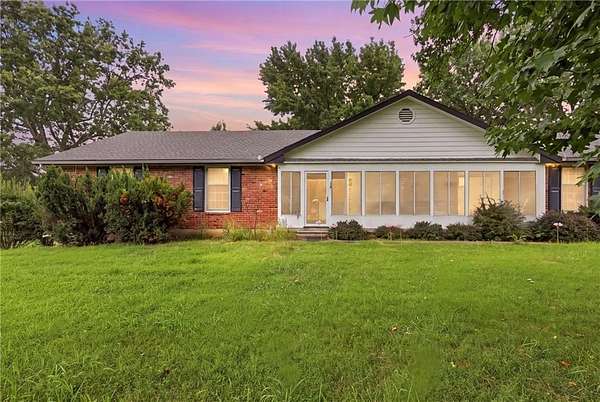 5 Acres of Land with Home for Sale in Peculiar, Missouri