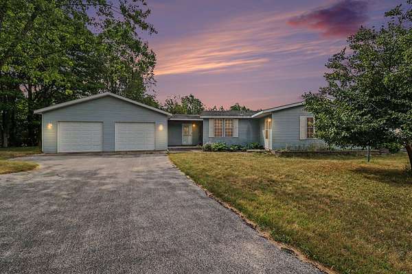 10 Acres of Land with Home for Sale in Mears, Michigan