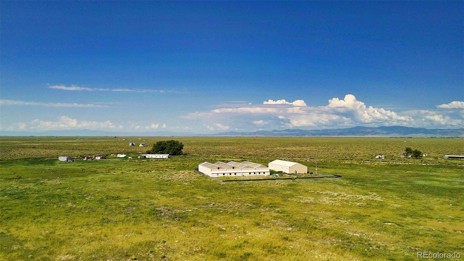 144 Acres of Land with Home for Sale in Moffat, Colorado