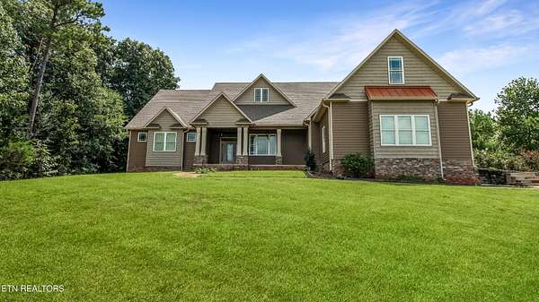 7.87 Acres of Land with Home for Sale in Oldfort, Tennessee