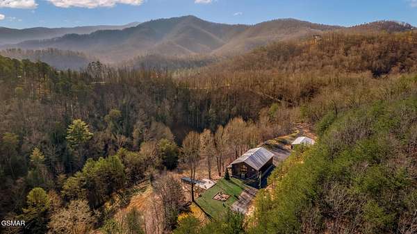 23.7 Acres of Recreational Land with Home for Sale in Sevierville, Tennessee