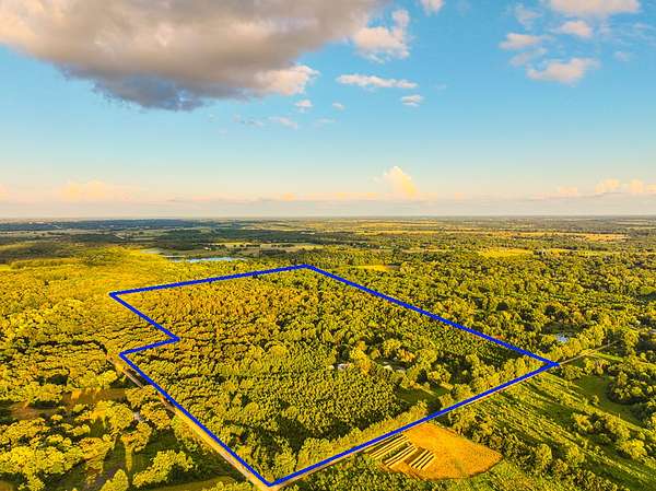 69.7 Acres of Recreational Land with Home for Sale in Walker, Missouri