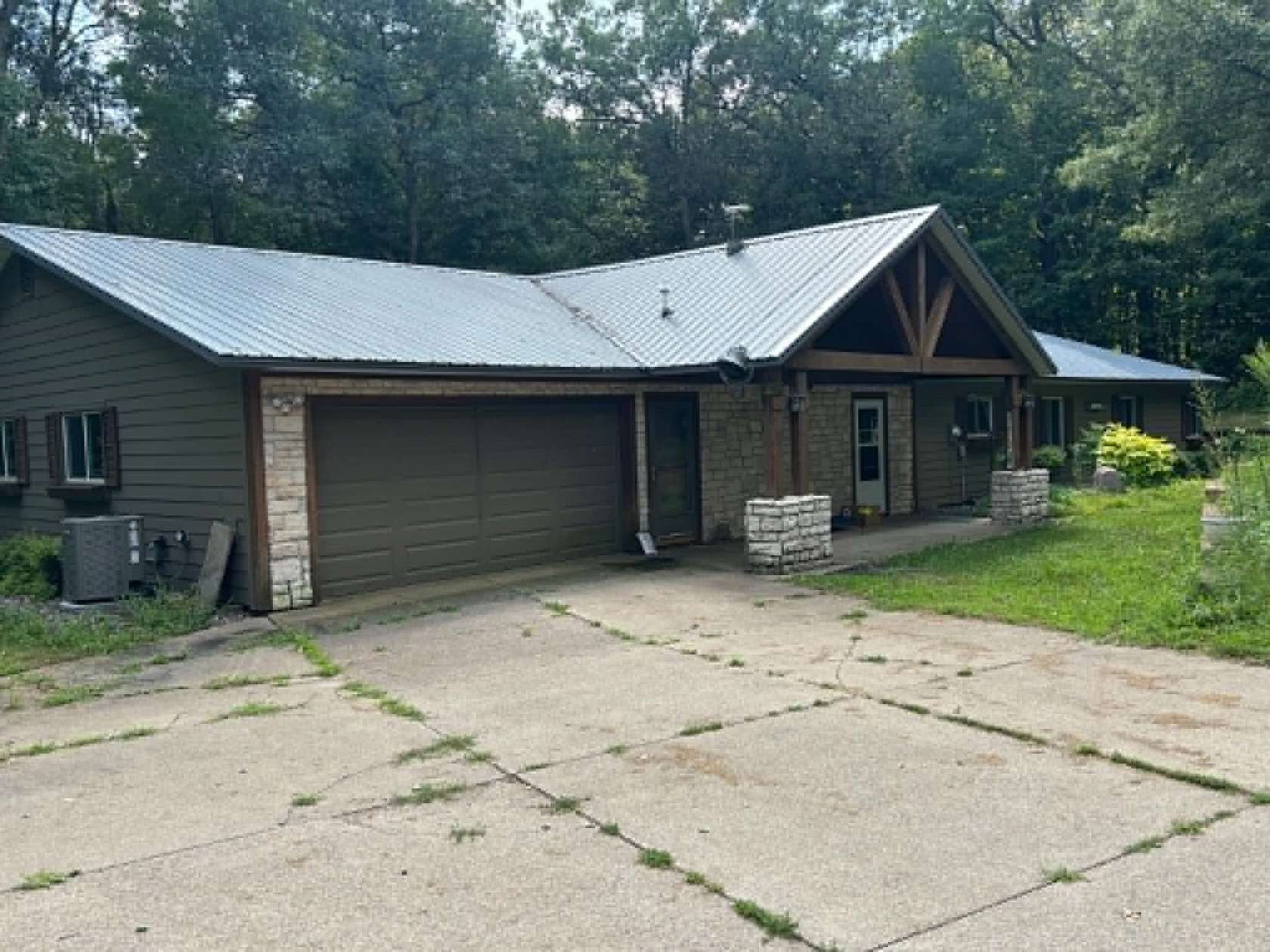 7.33 Acres of Land with Home for Auction in Menomonie, Wisconsin