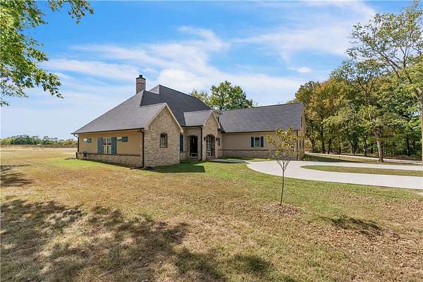6 Acres of Land with Home for Sale in Tontitown, Arkansas
