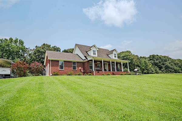 4.5 Acres of Land with Home for Sale in Leoma, Tennessee