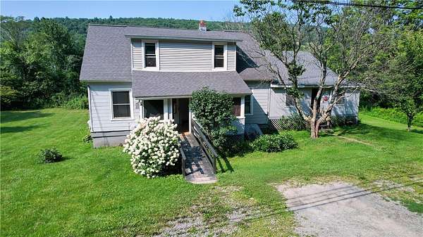3.9 Acres of Land with Home for Sale in Walton, New York