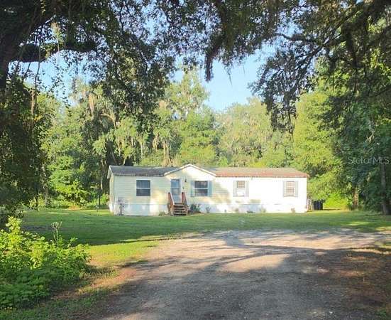 9.75 Acres of Land with Home for Sale in Webster, Florida