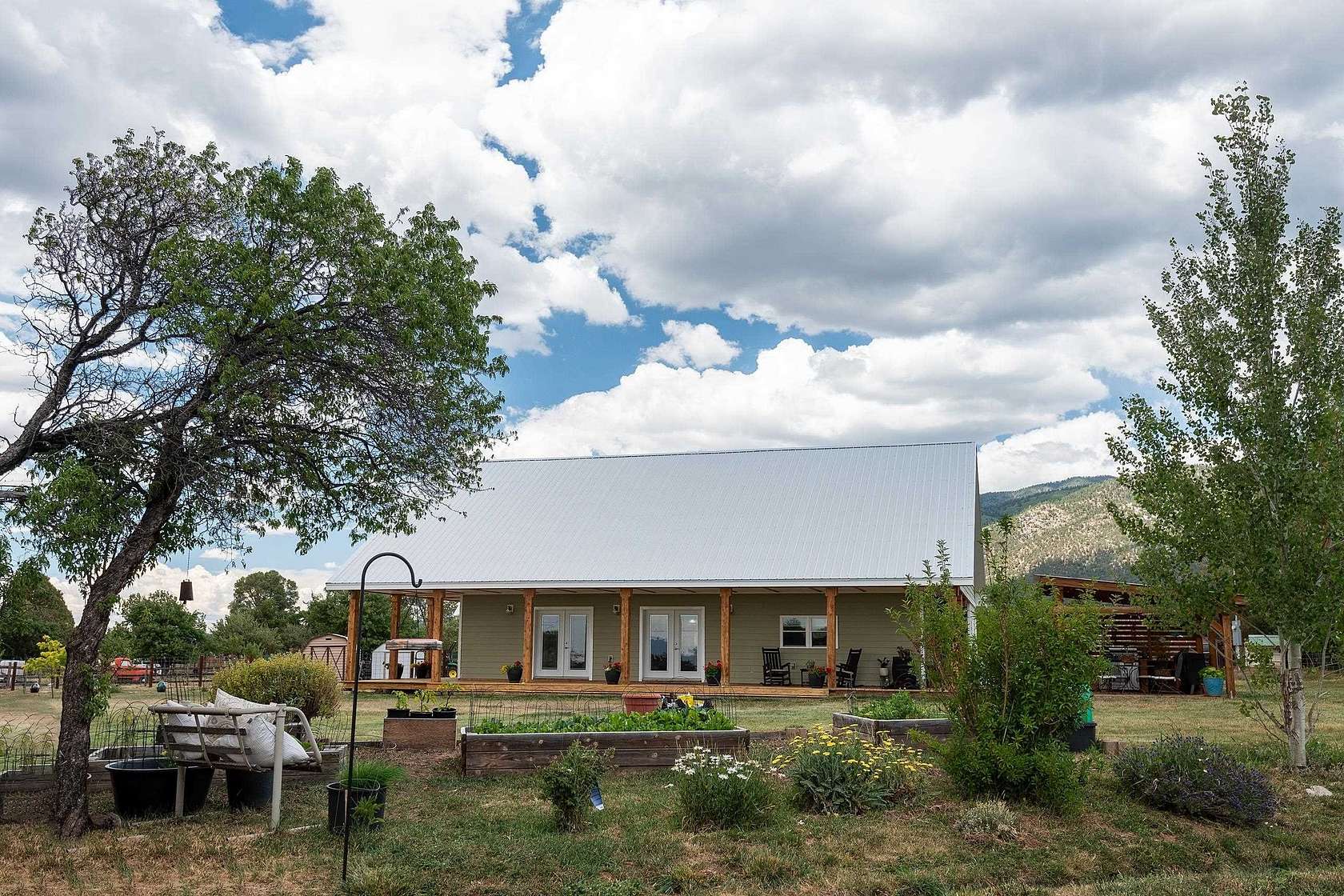 6.89 Acres of Land with Home for Sale in Arroyo Seco, New Mexico