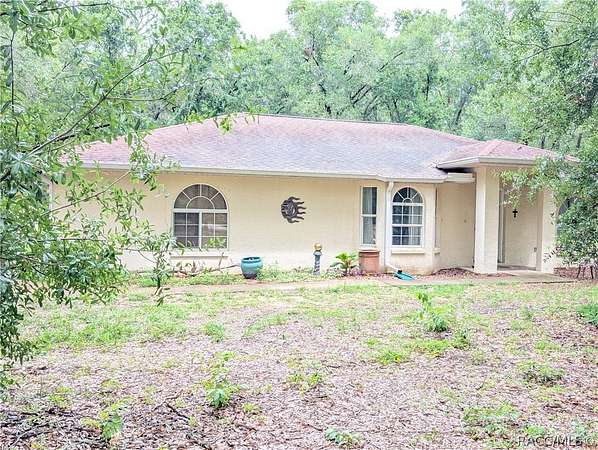 2.46 Acres of Land with Home for Sale in Inverness, Florida