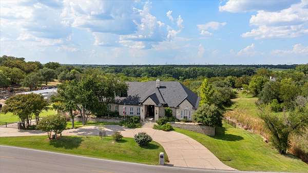 2.77 Acres of Land with Home for Sale in Granbury, Texas