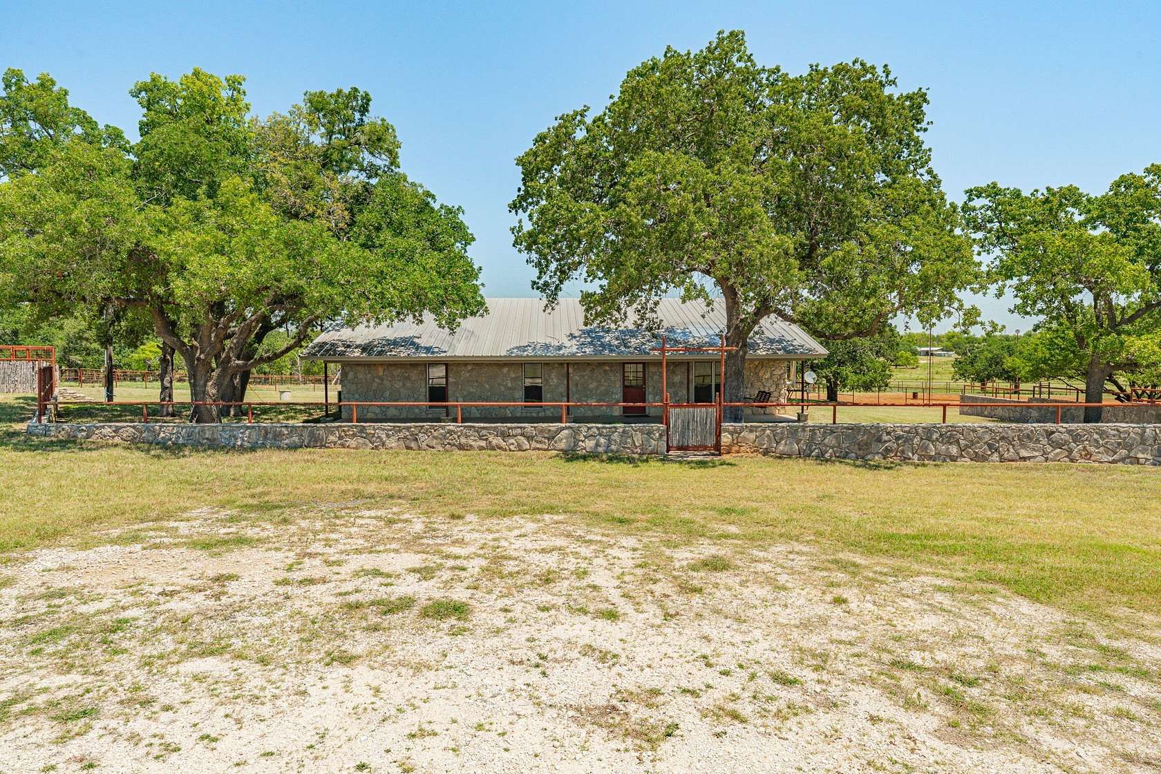 76.8 Acres of Agricultural Land with Home for Sale in Stephenville, Texas