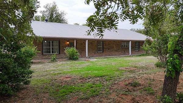 10 Acres of Land with Home for Sale in Harrah, Oklahoma