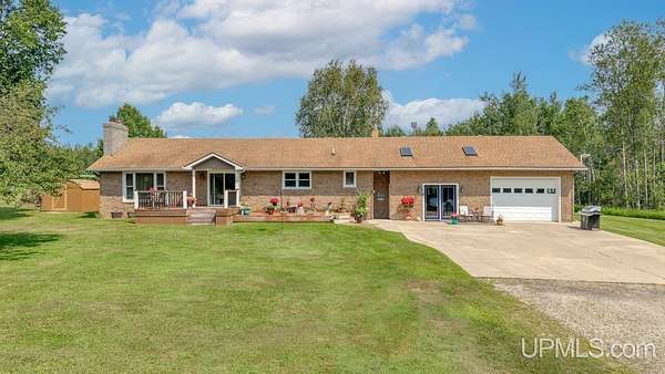 20 Acres of Recreational Land with Home for Sale in Cornell, Michigan