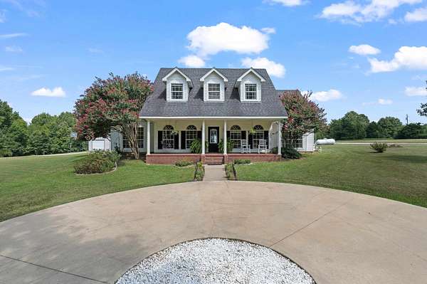 14.9 Acres of Land with Home for Sale in Carthage, Texas