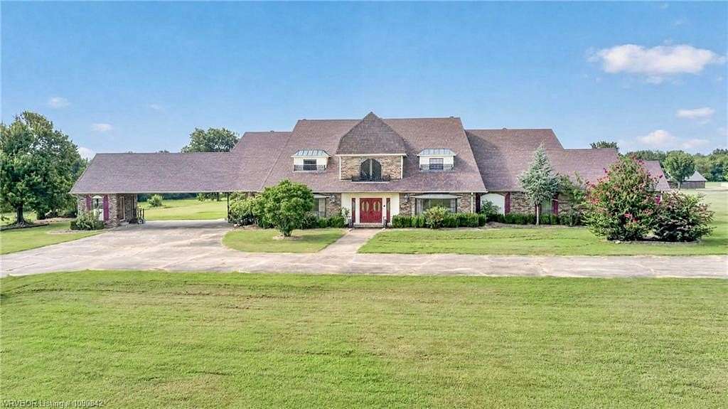 6.59 Acres of Land with Home for Sale in Roland, Oklahoma
