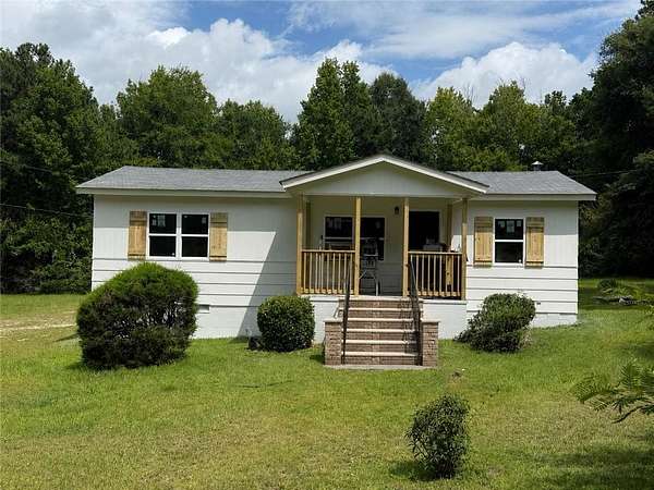 2.5 Acres of Land with Home for Sale in Smiths Station, Alabama