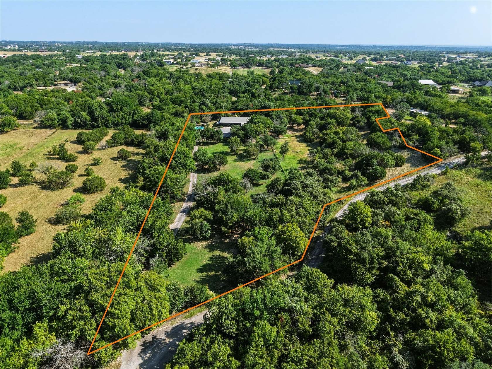 4.68 Acres of Land with Home for Sale in Weatherford, Texas