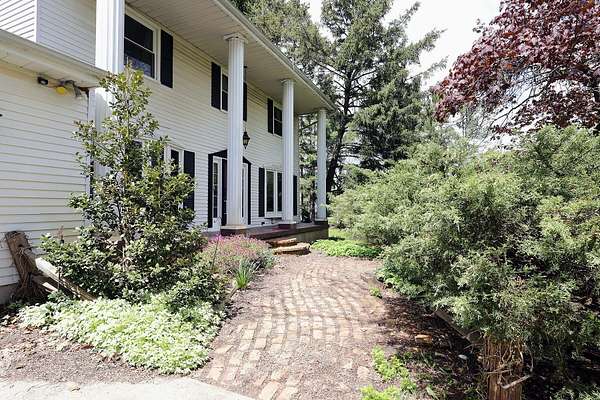 7.27 Acres of Land with Home for Sale in Chelsea, Michigan