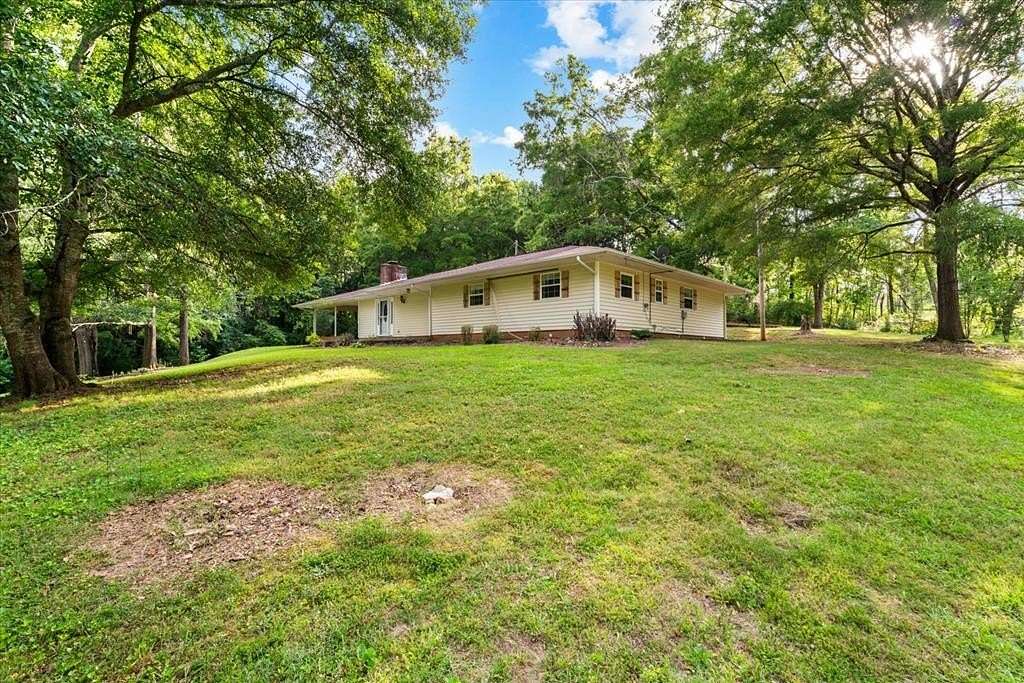 26.7 Acres of Land with Home for Sale in Dalton, Georgia