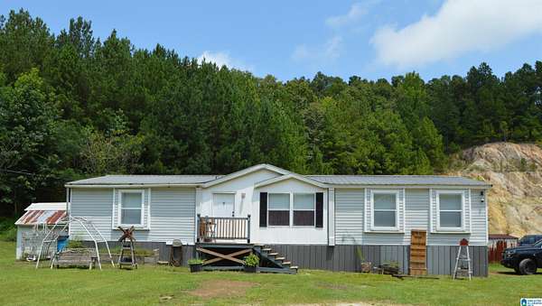 6.6 Acres of Land with Home for Sale in Odenville, Alabama