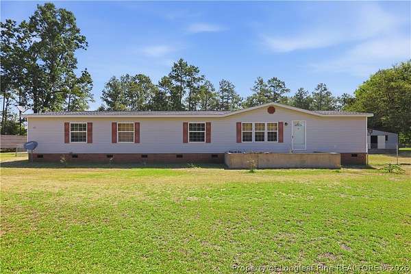 2.5 Acres of Land with Home for Sale in Tar Heel, North Carolina