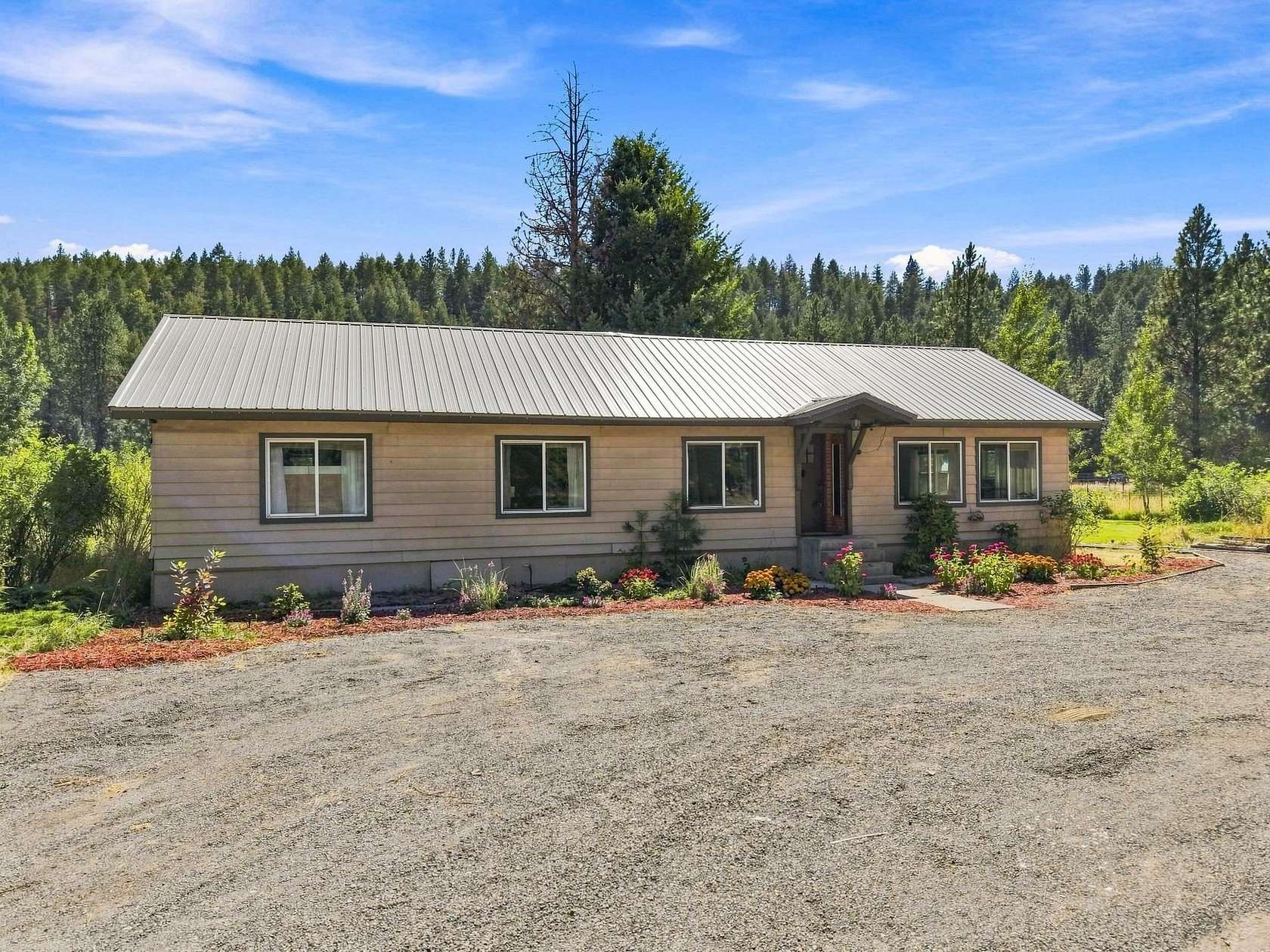 7.26 Acres of Land with Home for Sale in Nine Mile Falls, Washington
