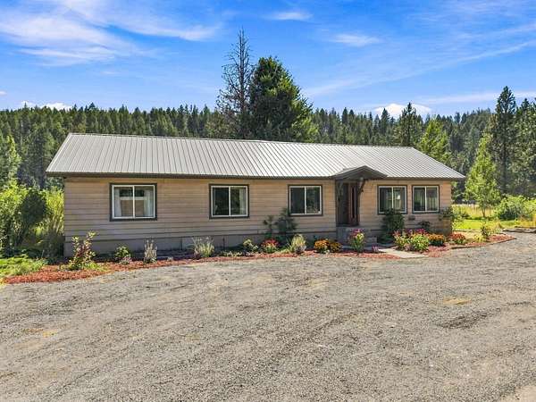 7.26 Acres of Land with Home for Sale in Nine Mile Falls, Washington
