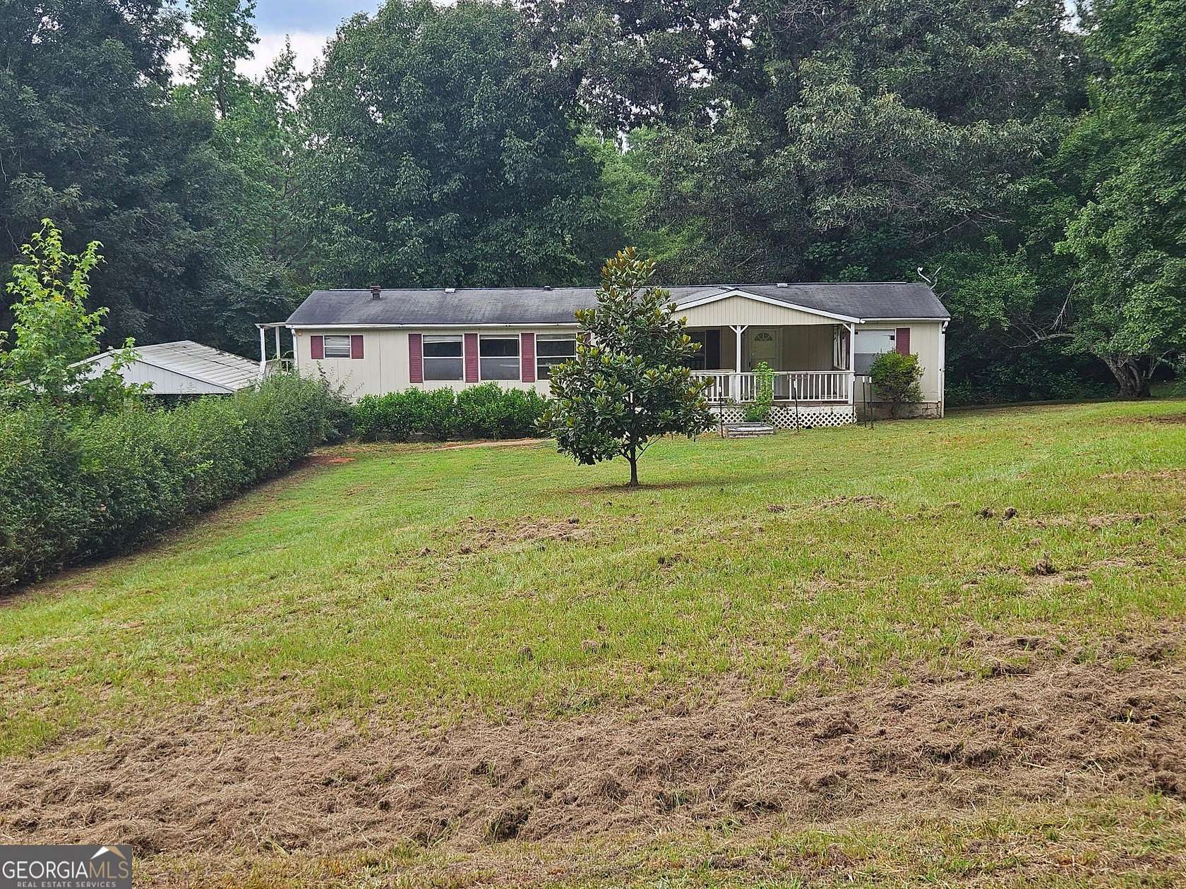 3.76 Acres of Land with Home for Sale in Forsyth, Georgia