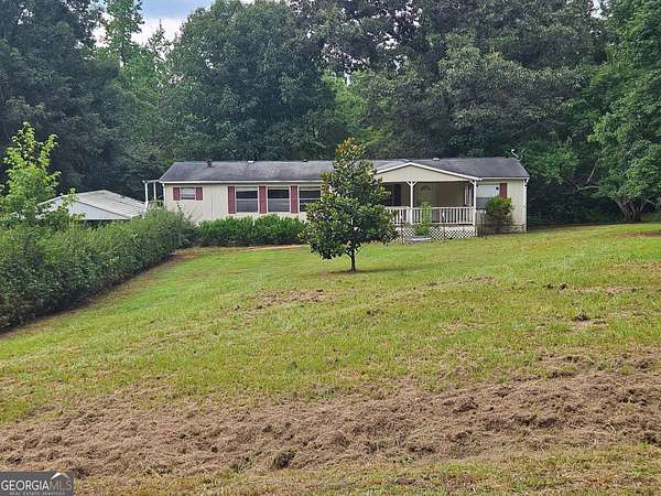 3.76 Acres of Land with Home for Sale in Forsyth, Georgia