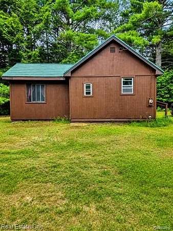 2 Acres of Land with Home for Sale in Superior Township, Michigan