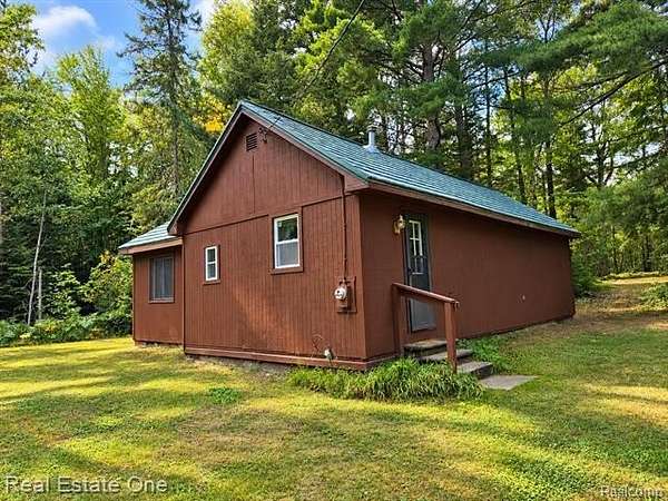 5 Acres of Land with Home for Sale in Superior Township, Michigan