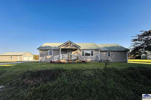 20 Acres of Agricultural Land with Home for Sale in Center Point, Indiana
