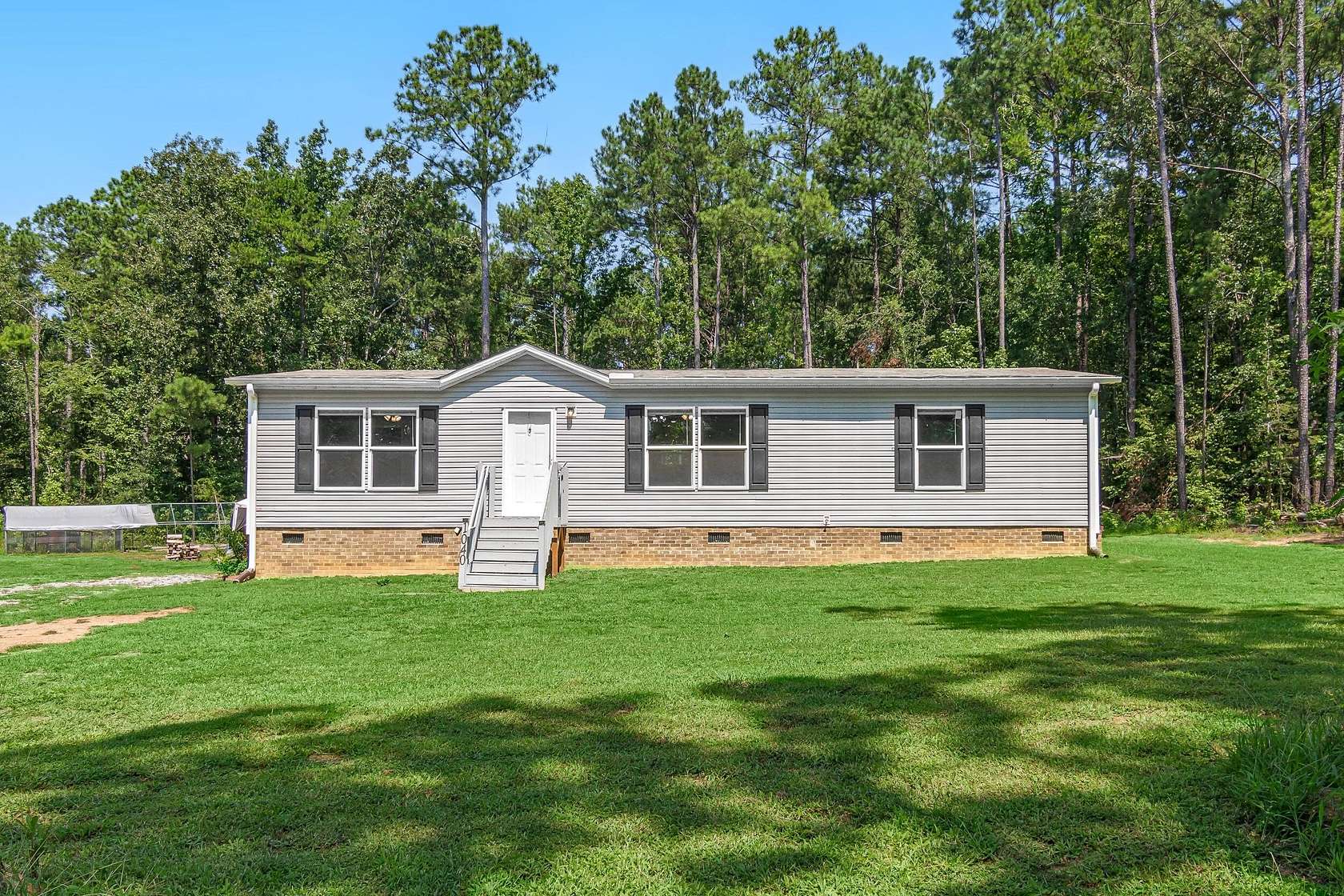 6.29 Acres of Land with Home for Sale in Waterloo, South Carolina