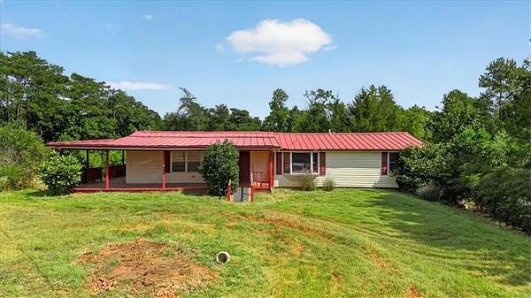 5.68 Acres of Land with Home for Sale in Ball Ground, Georgia