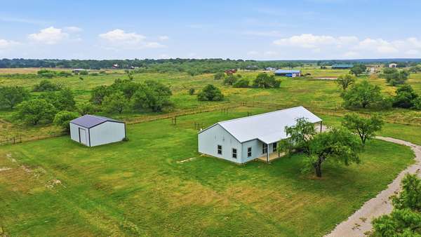 16.2 Acres of Land with Home for Sale in Millsap, Texas