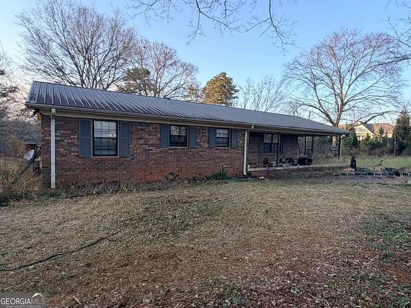 1.5 Acres of Land with Home for Sale in Commerce, Georgia