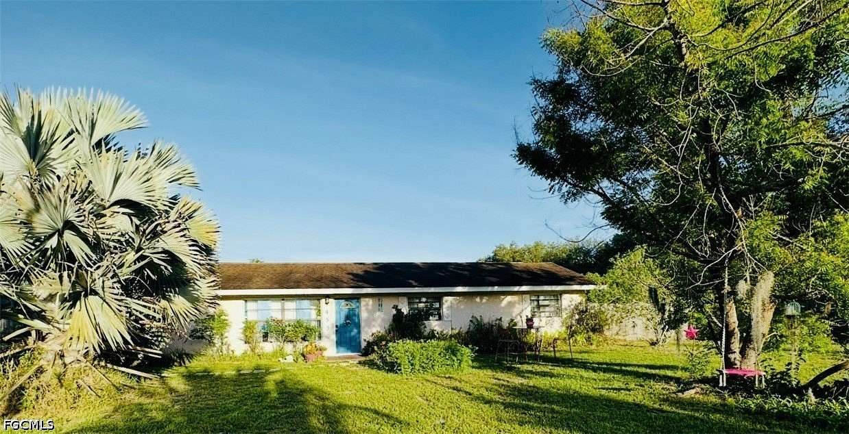 2.38 Acres of Land with Home for Sale in Fort Denaud, Florida