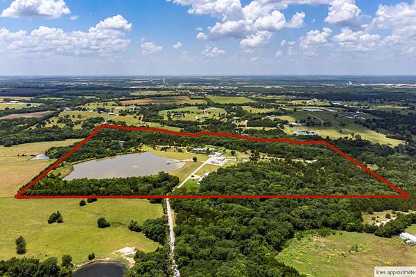 79.5 Acres of Recreational Land with Home for Sale in Howe, Texas