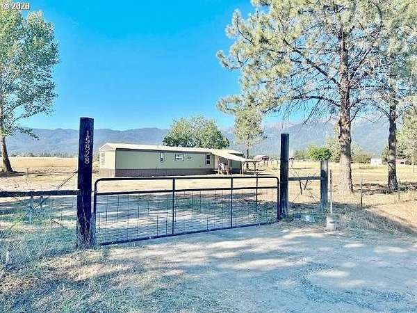9.77 Acres of Land with Home for Sale in Baker City, Oregon