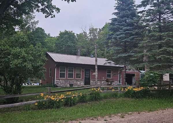 5 Acres of Land with Home for Sale in Stanwood, Michigan