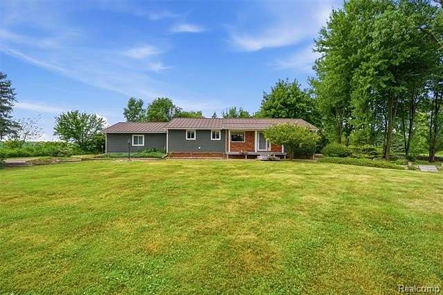 5.25 Acres of Land with Home for Sale in Riley Township, Michigan
