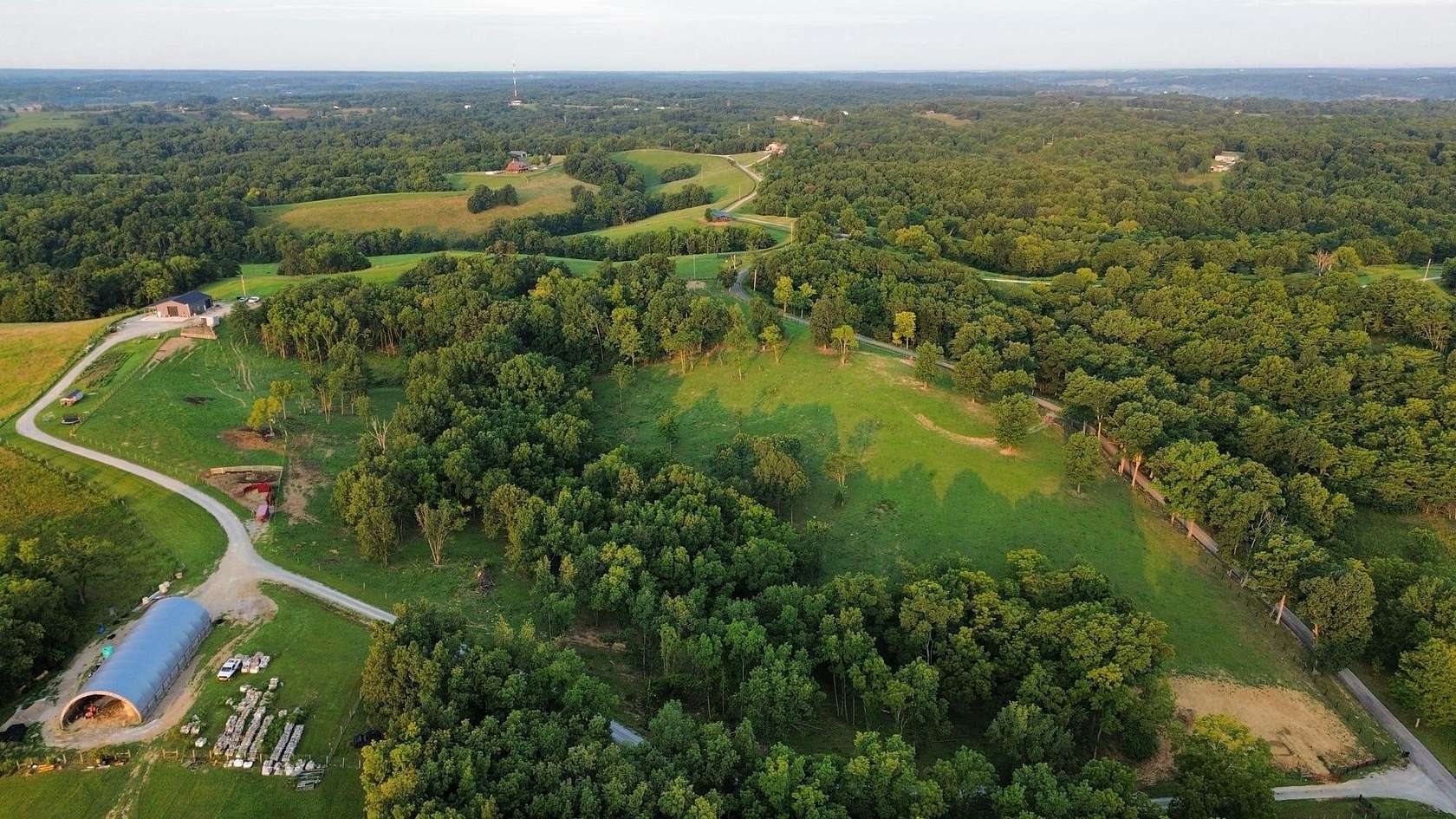 20.9 Acres of Land with Home for Sale in Berry, Kentucky