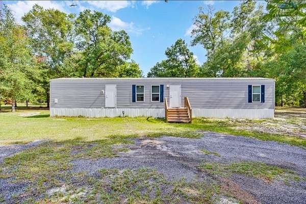4.48 Acres of Land with Home for Sale in Branford, Florida