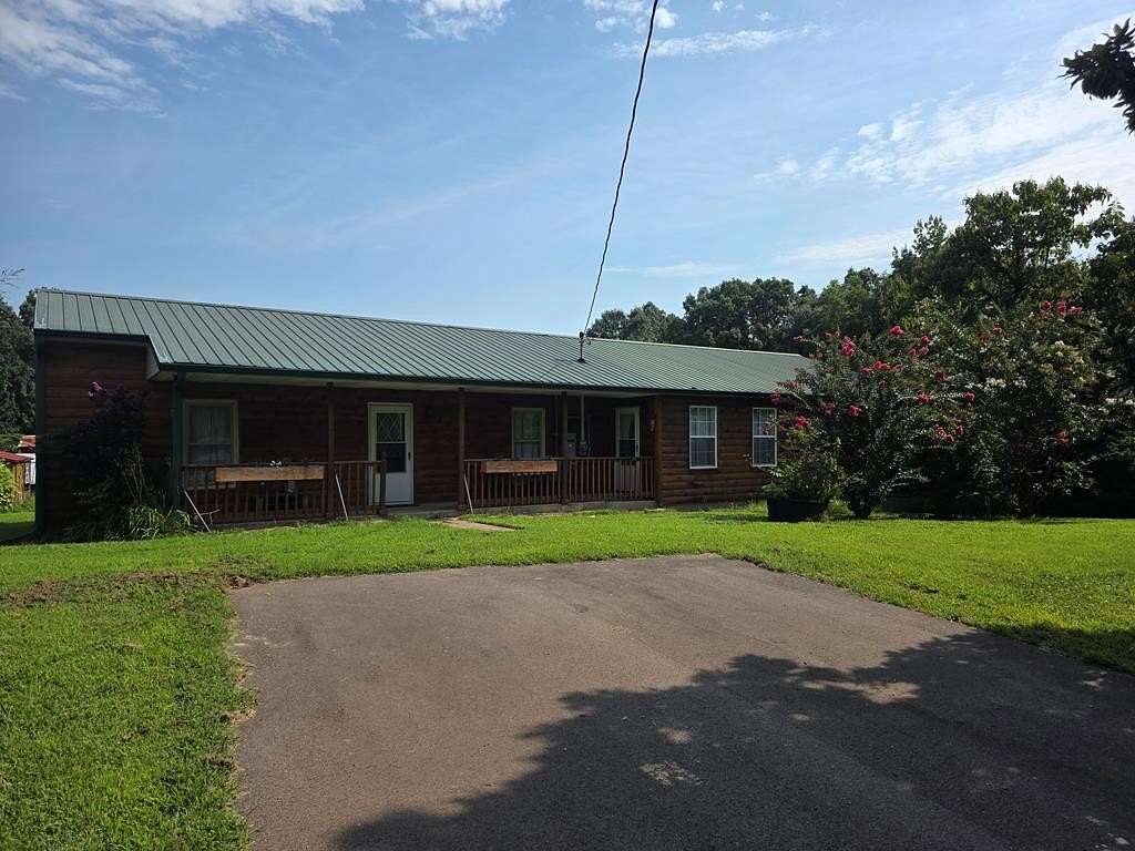 15 Acres of Land with Home for Sale in McKenzie, Tennessee