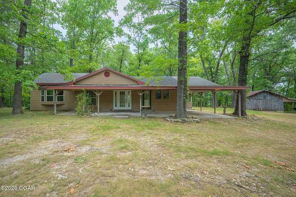 7.2 Acres of Land with Home for Sale in Neosho, Missouri