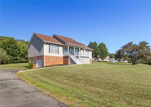 2 Acres of Land with Home for Sale in Pinnacle, North Carolina