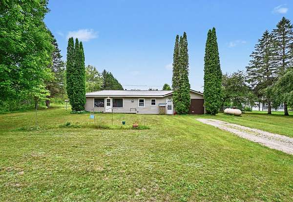 1.79 Acres of Land with Home for Sale in Kalkaska, Michigan